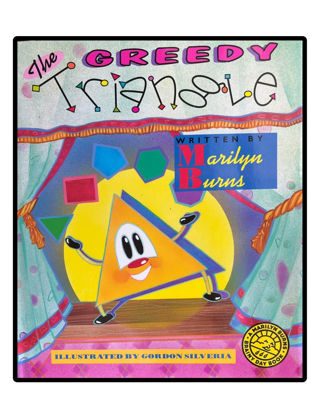 The Greedy Triangle by Marilyn Burns Hardcover  Kids Book